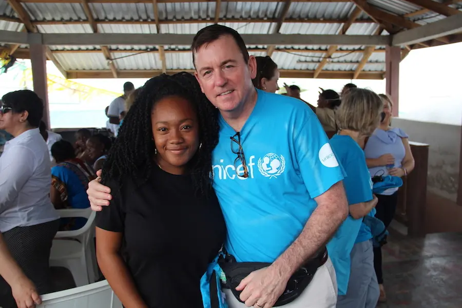 Two People Smiling for the Camera