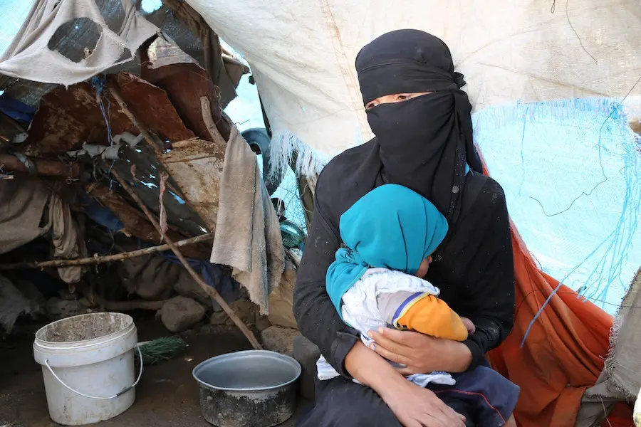 Woman Holding Child