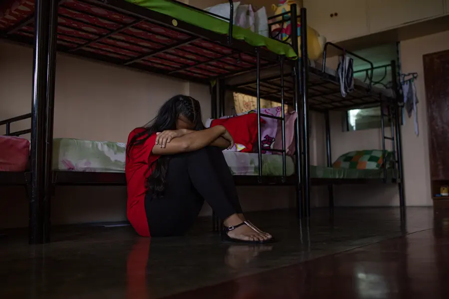 Girl with her Head Down Looking Upset