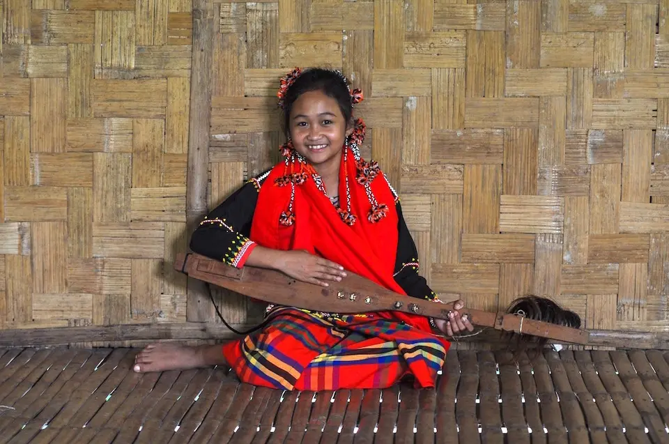 Girl Holding Instrument