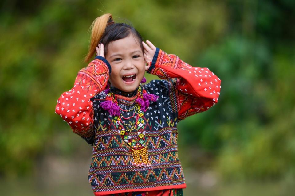 Child Smiling and Laughing