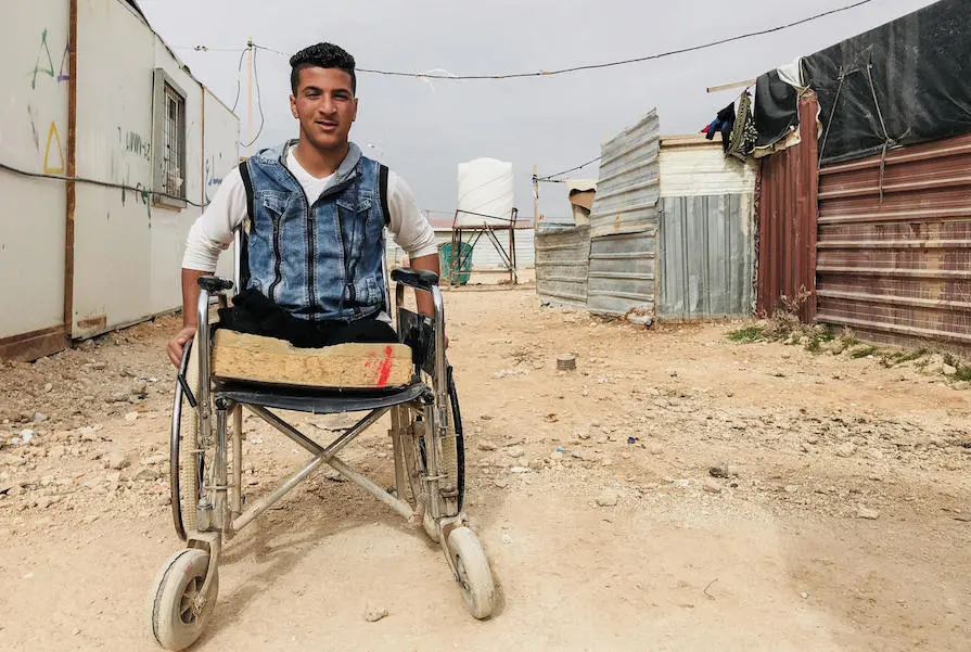 Syrian refugee Sami, 14, lost his legs in a bomb blast that killed his cousins in Dera'a, Syria. For the past four years, he has been living in Za'atari refugee camp in Jordan. Syrian refugee Sami, 14, lost his legs in a bomb blast that killed his cousins in Dera'a, Syria. For the past four years, he has been living in Za'atari refugee camp in Jordan.