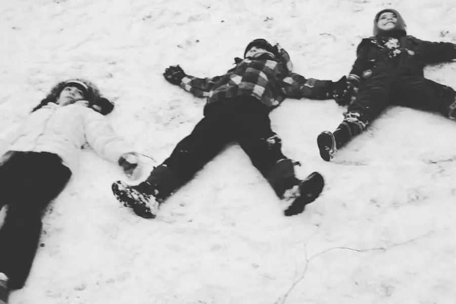 Kids Making Snow Angels