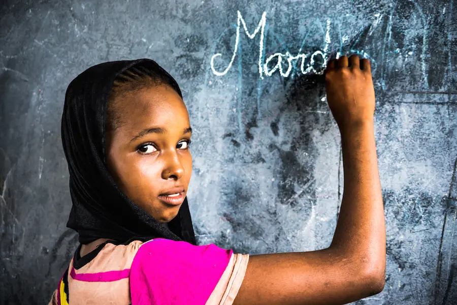 Thanks to UNICEF supplied sanitary napkins, 15-year-old Hawa, a student at a school near the refugee camp where she lives, has the confidence to leave home during her period. "I love understanding things, that's why I love school." Thanks to UNICEF supplied sanitary napkins, 15-year-old Hawa, a student at a school near the refugee camp where she lives, has the confidence to leave home during her period. "I love understanding things, that's why I love school."