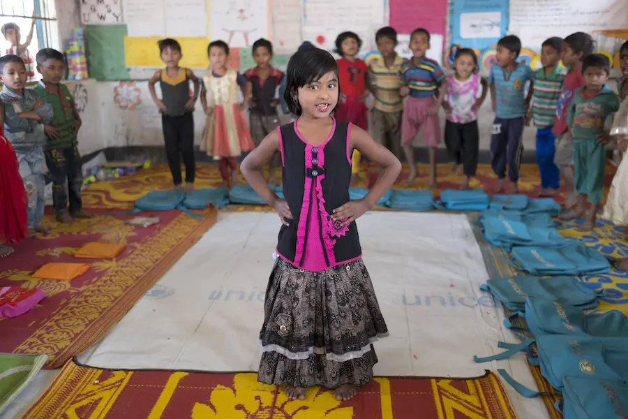 Girl Standing in Group of Kids
