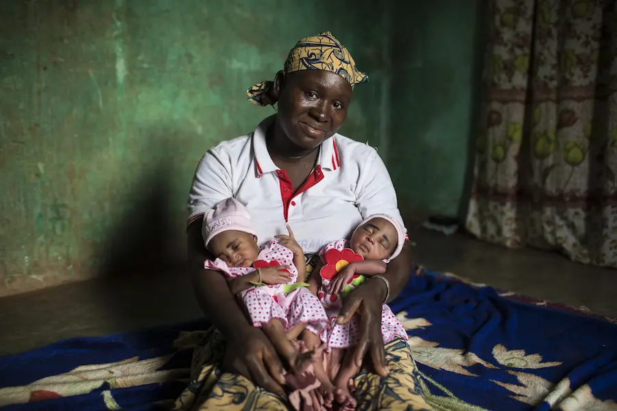 Fatoumata of Mali, mother of five pictured with her twin daughters, makes sure all her children get vaccinated to keep them healthy. Fatoumata of Mali, mother of five pictured with her twin daughters, makes sure all her children get vaccinated to keep them healthy.