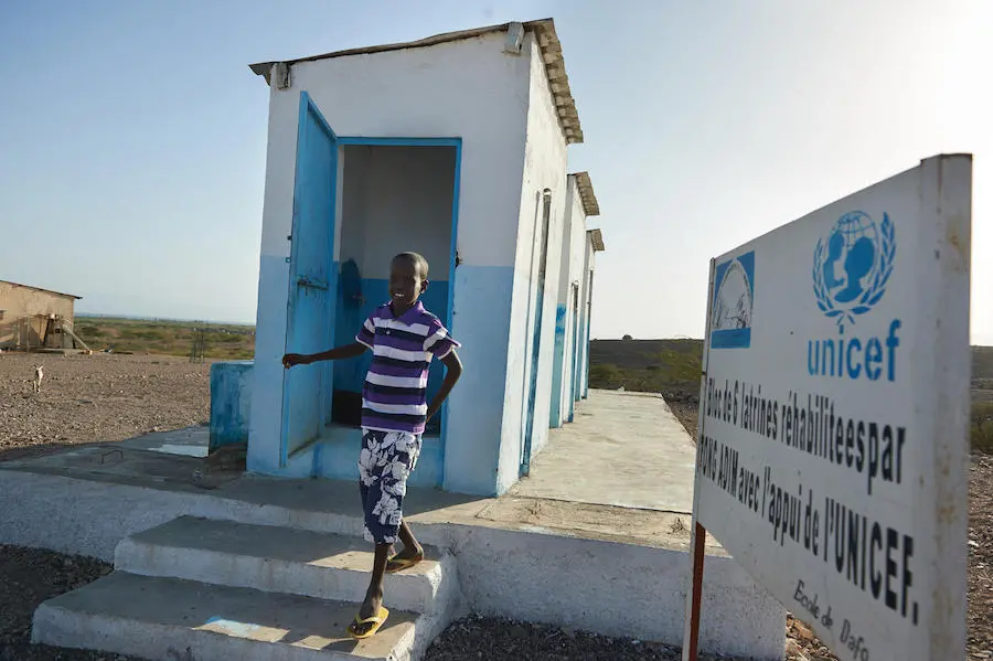 A young boy uses a sanitary latrine outside a UNICEF-supported school in the village of Dafo in southern Djibouti in 2018. UNICEF, sanitation, World Toilet Day, Djibouti