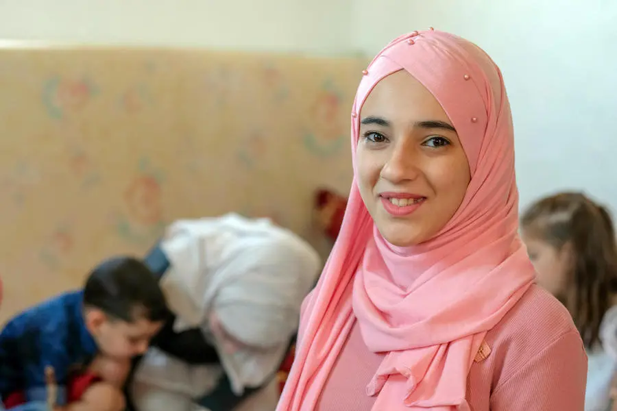 The Syrian civil war forced 14-year-old Dareen and her family out of their home in Damascus, Syria. Now they live in Mafraq, a large refugee-hosting city in Jordan, with assistance from UNICEF's Hajati program. The Syrian civil war forced 14-year-old Dareen and her family out of their home in Damascus, Syria. Now they live in Mafraq, a large refugee-hosting city in Jordan, with assistance from UNICEF's Hajati program.