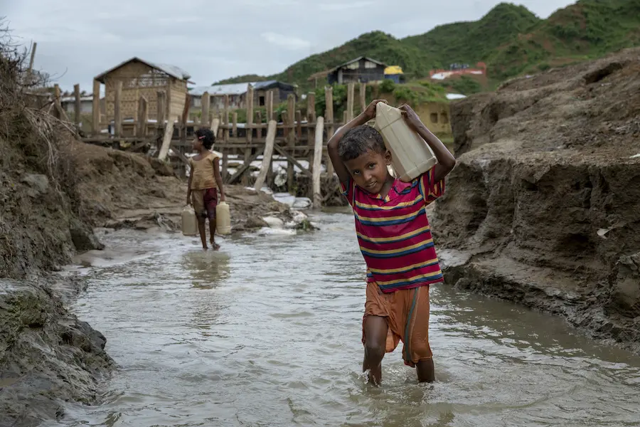 Bibi, 10, fetches water twice a day for his family in Cox's Bazar, Bangladesh, where UNICEF and partners are working to improve access to clean water for Rohingya refugees living in camps and the surrounding host community. Bibi, 10, fetches water twice a day for his family in Cox's Bazar, Bangladesh, where UNICEF and partners are working to improve access to clean water for Rohingya refugees living in camps and the surrounding host community.