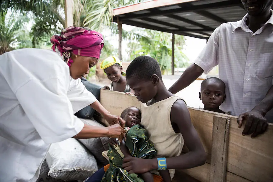 On 21 May 2018, two UNICEF-supported nurses spend a day vaccinating children in the village of Salanga in the Central African Republic. On 21 May 2018, two UNICEF-supported nurses spend a day vaccinating children in the village of Salanga in the Central African Republic.