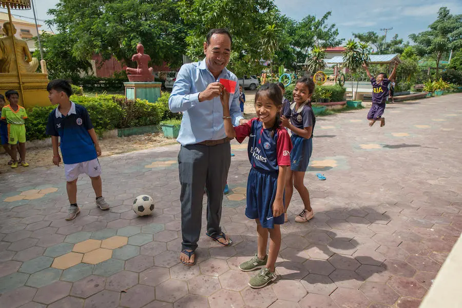 Instead of applying physical punishment, teachers use the card system to give warnings in Peam Ror School in Svay Rieng Province, Cambodia. Instead of applying physical punishment, teachers use the card system to give warnings in Peam Ror School in Svay Rieng Province, Cambodia.