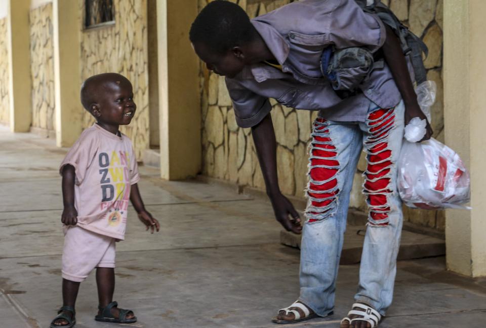 On 16 August 2018 in the Central African Republic, Pierre Mbassissi returns with his father for his follow up outpatient treatment at the Centre de Santé Saint Joseph, on the outskirts of Bangui.