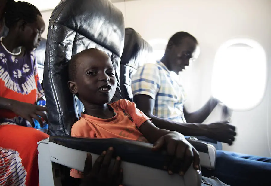 Chogi, 8, and his siblings en route to reuniting with their mother. Chogi, 8, and his siblings are being reunited with their mother. The family was separated after a surprise militia attack five years ago.