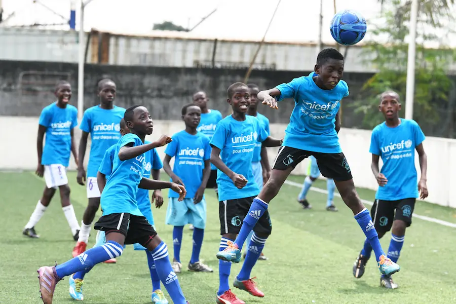 On World Children's Day, kids play soccer in Abidjan, the capital of Côte d'Ivoire. On World Children's Day, kids play soccer in Abidjan, the capital of Côte d'Ivoire.