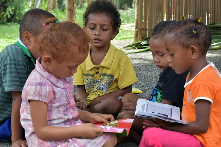 In July 2018, a group of young preschoolers read at Ladava Early Learning Center, supported by UNICEF, in Alotau, Milne Bay Province, Papua New Guinea. In July 2018, a group of young preschoolers read at Ladava Early Learning Center, supported by UNICEF, in Alotau, Milne Bay Province, Papua New Guinea.