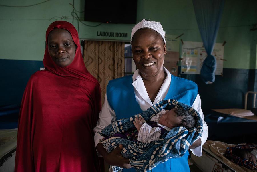 UNICEF-trained midwife Rahama Kadafa (right) safely delivered Hajara Umar's baby daughter, Harira at Nana As'mau clinic in Yola, Nigeria in October 2018. 
