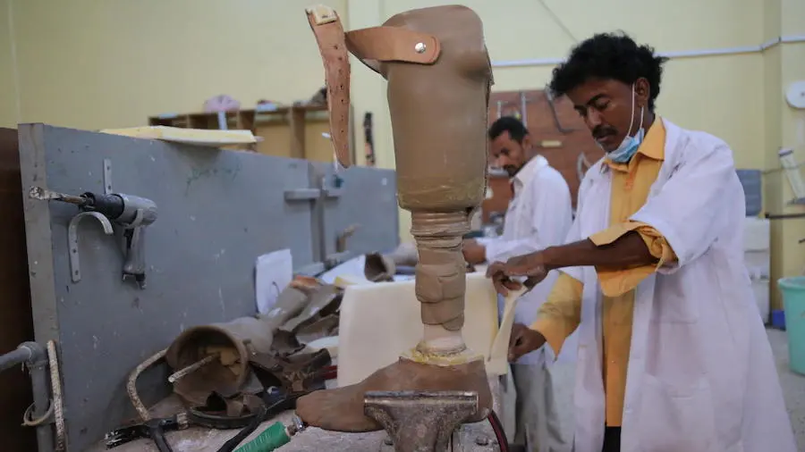 On December 5, 2018, staff construct artificial limbs in the UNICEF-supported Prostheses and Physiotherapy Center in Aden, Yemen. UNICEF, Yemen, Prostheses and Physiotherapy Clinic, Aden