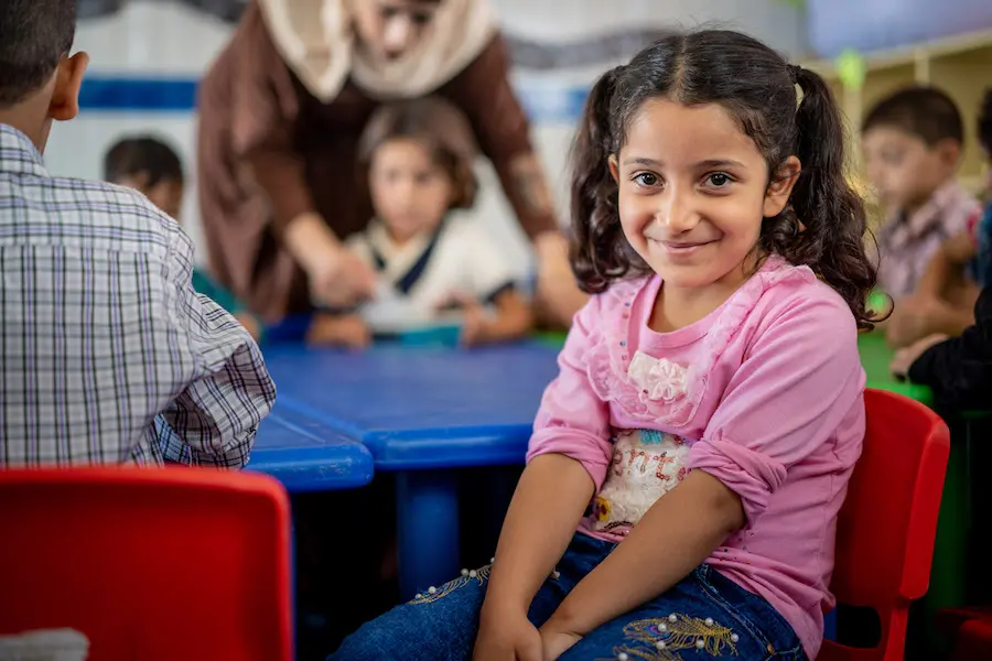 The first generation of children born in Za'atari Refugee Camp have started school. “They are the same as children all over the world,” says the Kindergarten teacher. “They need to be prepared for school. Preschool is important for their well being." The first generation of children born in Za'atari Refugee Camp have started school. “They are the same as children all over the world,” says the Kindergarten teacher. “They need to be prepared for school. Preschool is important for their well being."