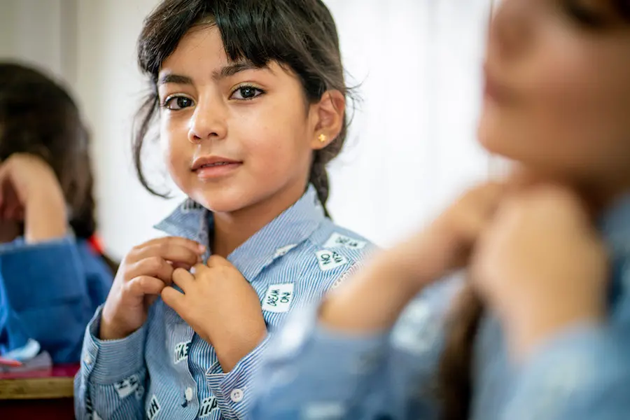 Aia, 7 years, beside her sister Zana, 8 years, in Arabic class. They teach me Maths, English and Arabic. It is helping to improve my grades at school. I love learning," says Zana Aia, 7 years, beside her sister Zana, 8 years, in Arabic class. They teach me Maths, English and Arabic. It is helping to improve my grades at school. I love learning," says Zana