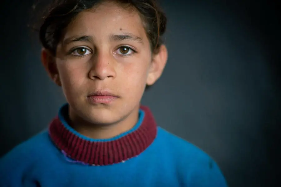 Yara, 10, still has her little doll from Syria in Za'atari Refugee Camp. Yara, 10, still has her little doll from Syria in Za'atari Refugee Camp.