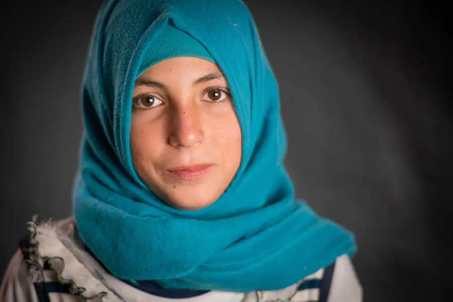 Nour, 12, still has her blanket from Syria in Za'atari refugee camp. Nour, 12, still has her blanket from Syria in Za'atari refugee camp.