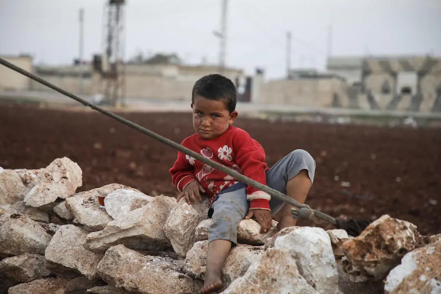 Families living in Batbu camp in western Aleppo, Syria are facing an especially harsh winter. Years of violence, displacement and loss of livelihoods have left families unable to provide for their children's most basic needs, including winter clothes. UNICEF, Syria, children in conflict