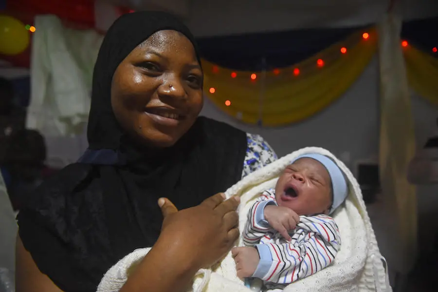 Basirat Adegbasan holds her newborn baby, the first born in 2019 at Lagos Island Maternity Hospital in Lagos central, Nigeria's capital. UNICEF, Nigeria, newborn care
