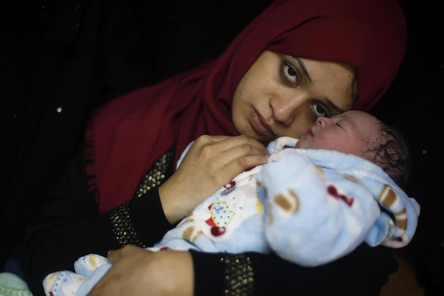 Samia and her newborn baby boy, Mohammed, at Al Shifaa hospital in Gaza City, Palestine on January 1, 2019.