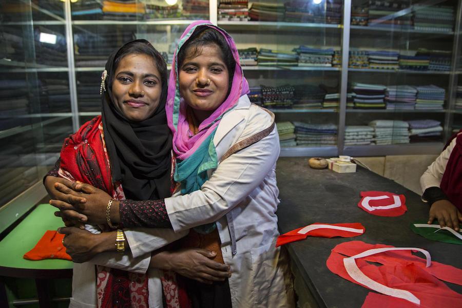 Jannatu, 17 (left), and Rajia, 18, are training to become tailors at a shop in Ukhiya, Bangladesh as part of a UNICEF-supported vocational skills program for young Rohingya refugees and young people in the surrounding communities. 