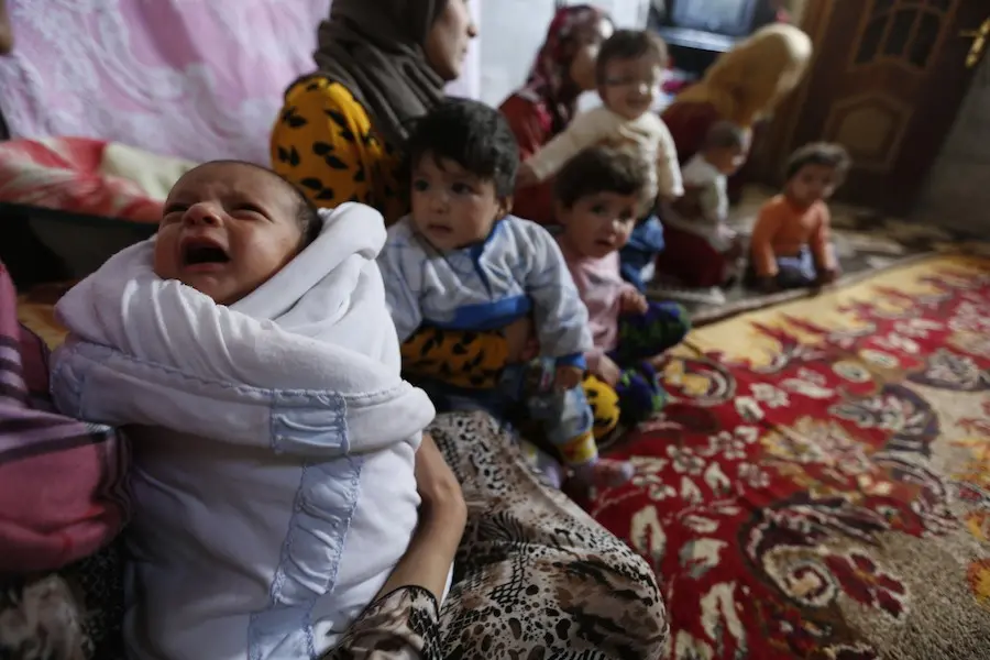 #SyriaCrisis An infant and family forced to leave their homes in Aleppo due to the conflict in Syria.