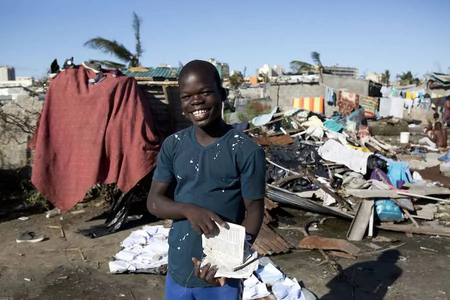 On 24 March 2019 in Mozambique, the school books of Caelono Colote, 15, are laid out to dry in an area that was flooded after Cyclone Idai made landfall in Beira. On 24 March 2019 in Mozambique, the school books of Caelono Colote, 15, are laid out to dry in an area that was flooded after Cyclone Idai made landfall in Beira.
