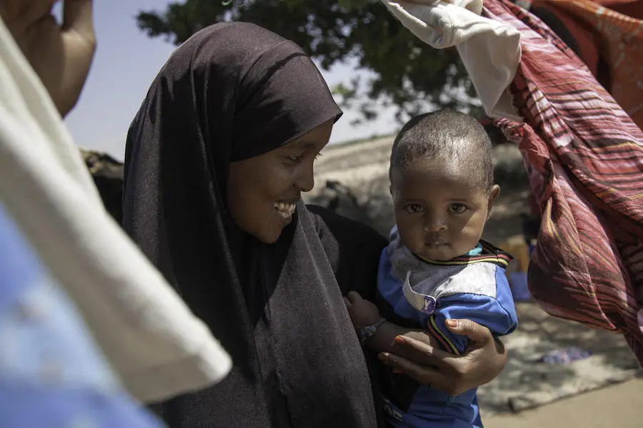 Hoodoo Said Hussein, 27, holds her 18-month-old son, Jimale, in Lasadawaco, Somaliland on March 5, 2019. Married when she was just 15, she dropped out of school after giving birth. She is now a student again, at a UNICEF-supported school. Hoodoo Said Hussein, 27, holds her 18-month-old son, Jimale, in Lasadawaco, Somaliland on March 5, 2019. Married when she was just 15, she dropped out of school after giving birth. She is now a student again, at a UNICEF-supported school.