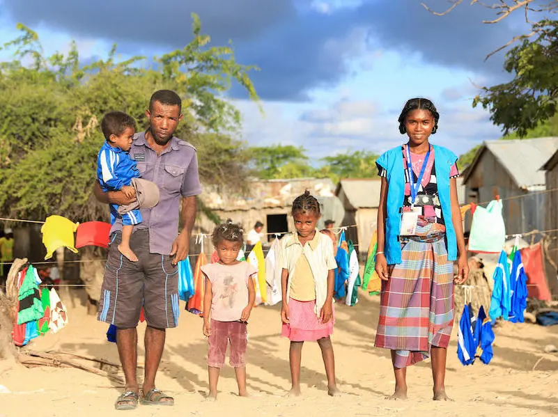 Zeme, seen here with her husband and three children, works as a UNICEF-trained Mother Leader in Tanandava, Madagascar. Zeme, seen here with her husband and three children, works as a UNICEF-trained Mother Leader in Tanandava, Madagascar.