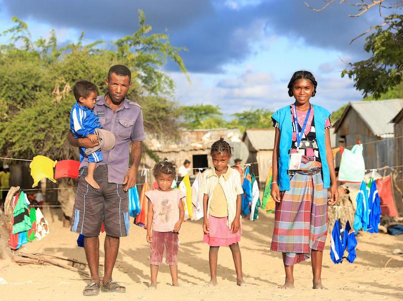Zeme, seen here with her husband and three children, works as a UNICEF-trained Mother Leader in Tanandava, Madagascar.