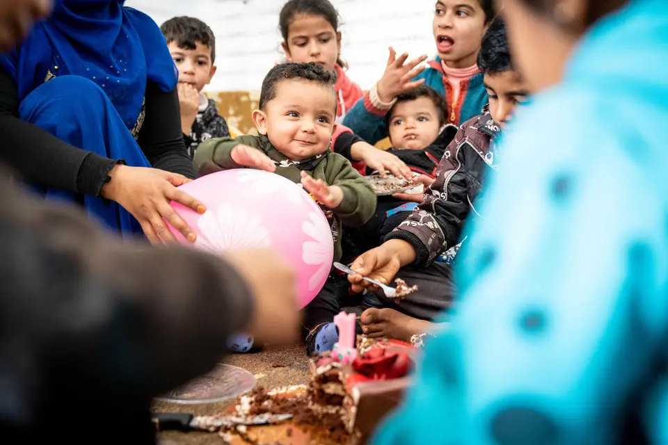 One-year-old Mohammad celebrates his first birthday in Azraq refugee camp in Jordan, where he was born in the UNICEF-supported pediatric ward. One-year-old Mohammad celebrates his first birthday in Azraq refugee camp in Jordan, where he was born in the UNICEF-supported pediatric ward.