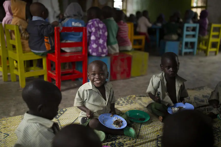 Alfonse, 2, has a hot, balanced meal at the UNICEF-supported Early Childhood Development center in Nyamiyaga Village, Northern Province, Rwanda on November 20, 2018. Alfonse, 2, has a hot, balanced meal at the UNICEF-supported Early Childhood Development center in Nyamiyaga Village, Northern Province, Rwanda on November 20, 2018.