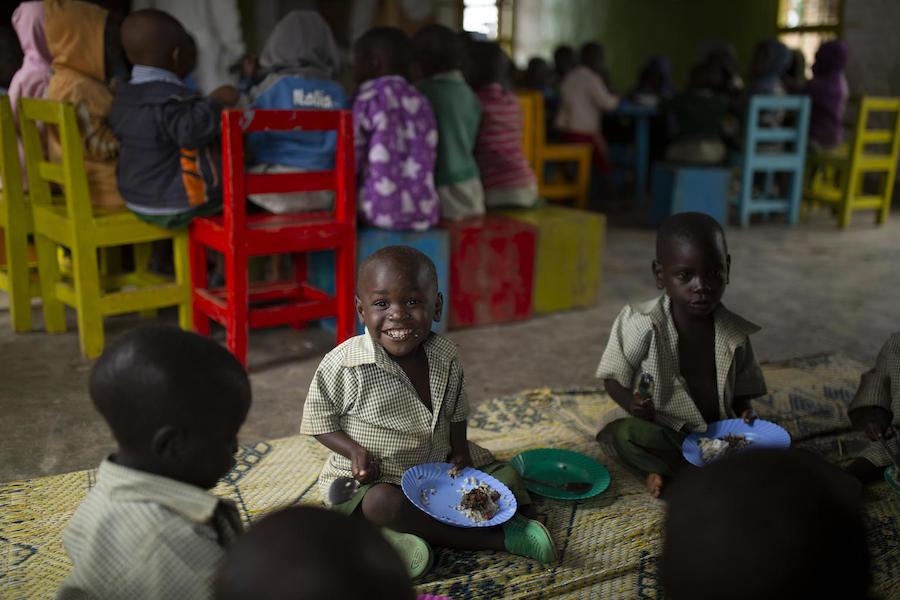 Alfonse, 2, has a hot, balanced meal at the UNICEF-supported Early Childhood Development center in Nyamiyaga Village, Northern Province, Rwanda on November 20, 2018.