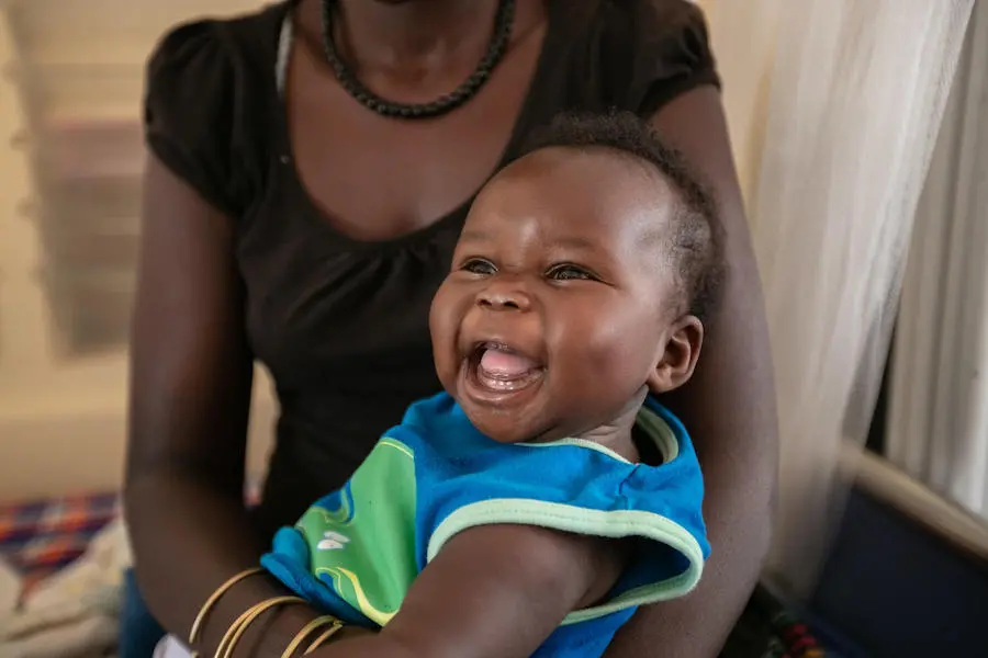 A healthy smiling baby in Mabilatuk HC IV, Kaabong District, Uganda in 2019. A healthy smiling baby in Mabilatuk HC IV, Kaabong District, Uganda in 2019.