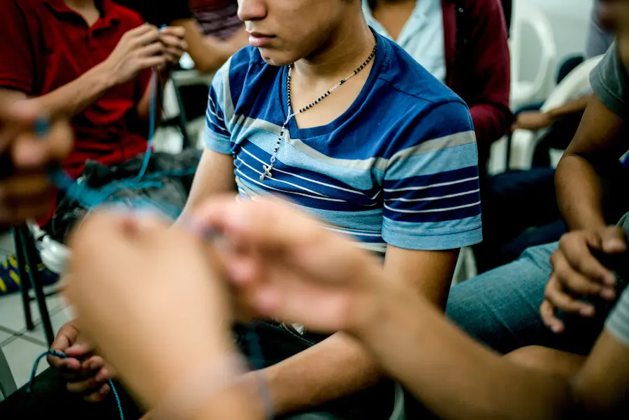 Teenagers during crafts class at the CAMEF shelter in Reynosa, Mexico in 2016. All minors caught trying to cross the border or deported back to Mexico are brought here. unicef, unicef usa, immigration, undocumented immigrants, immigrant children, migrant children, immigration reform, immigration policy