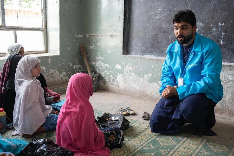UNICEF Education Officer Masood Nassir talks to a class of young women at Peer Sayed Ahmad Gilani School in Surkhrod district, Nangarhar province, Afghanistan in April 2019. UNICEF Education Officer Masood Nassir talks to a class of young women at Peer Sayed Ahmad Gilani School in Surkhrod district, Nangarhar province, Afghanistan in April 2019.