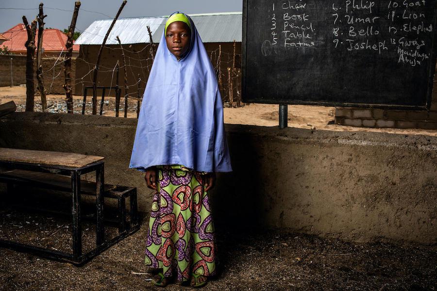 Hawa, 12, stands in an open-air classroom at Sabo Garawi Primary School in Gwoza, northeast Nigeria. 