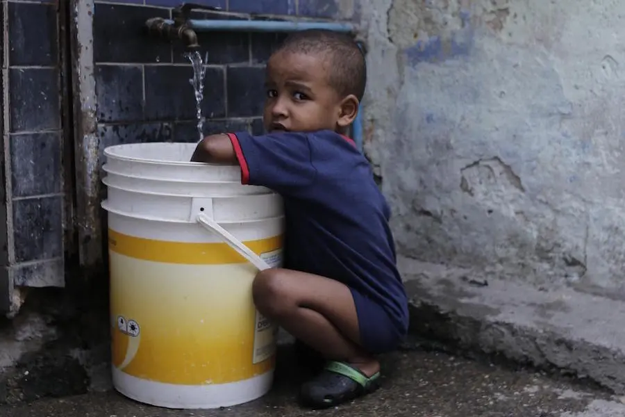In June 2019, a child collects water in Petare, one of the most vulnerable neighborhoods in Caracas, Venezuela. UNICEF provided safe drinking water to 400,000 people in Venezuela in the first half of 2019. In June 2019, a child collects water in Petare, one of the most vulnerable neighborhoods in Caracas, Venezuela. UNICEF provided safe drinking water to 400,000 people in Venezuela in the first half of 2019.