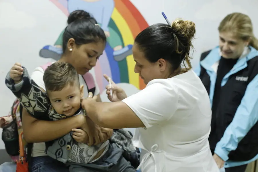 On 5 June 2019 in Venezuela, a child is immunized against yellow fever at a UNICEF-supported health center in las Minas de Baruta, Caracas. On 5 June 2019 in Venezuela, a child is immunized against yellow fever at a UNICEF-supported health center in las Minas de Baruta, Caracas.