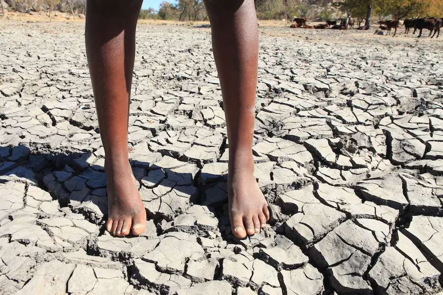 Feet on Cracked Earth