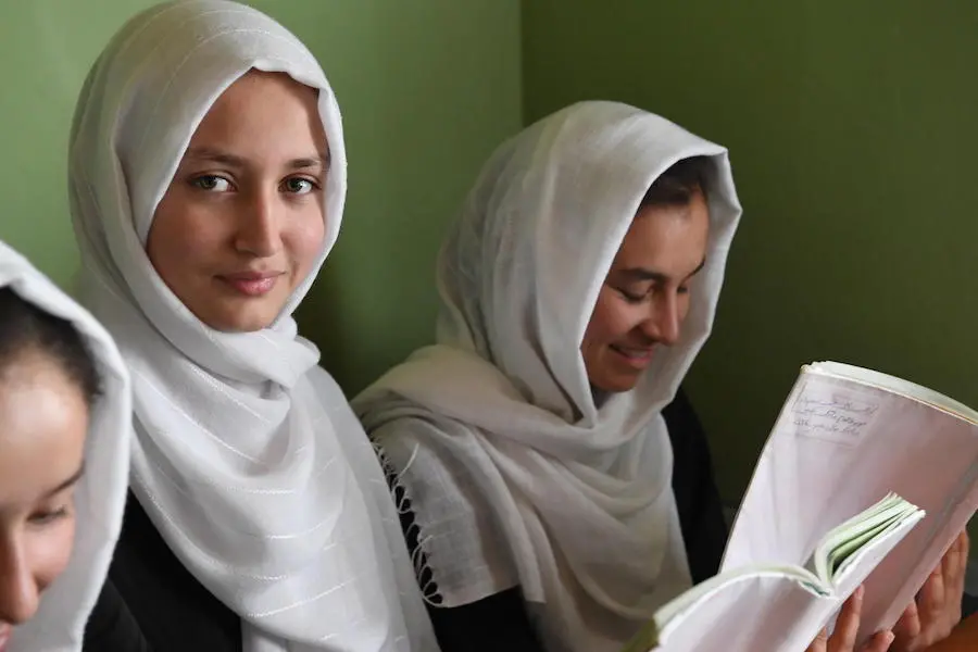 Children study in two shifts at UNICEF-supported Sayef High School in Faizabad, Badakhshan, northern Afghanistan: girls in the morning, boys in the afternoon. Children study in two shifts at UNICEF-supported Sayef High School in Faizabad, Badakhshan, northern Afghanistan: girls in the morning, boys in the afternoon.