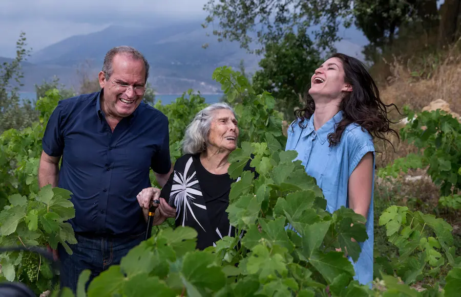 Three People Laughing in Nature