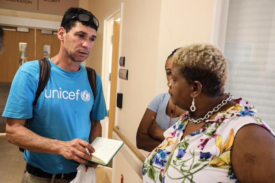 On September 7, 2019, UNICEF Regional Emergency Specialist Hanoch Barlevi talks to a nurse in one of the main hospitals of Marsh Harbour Town.