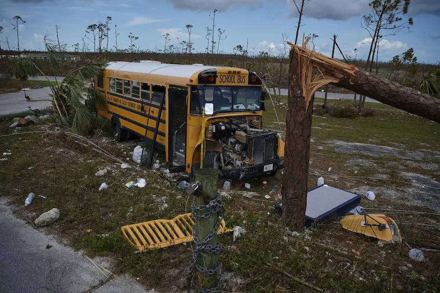 On September 8, 2019 in the Bahamas, a damaged school bus outside St. Francis Church in Marsh Harbour in Abaco Island. On September 8, 2019 in the Bahamas, a damaged school bus outside St. Francis Church in Marsh Harbour in Abaco Island.