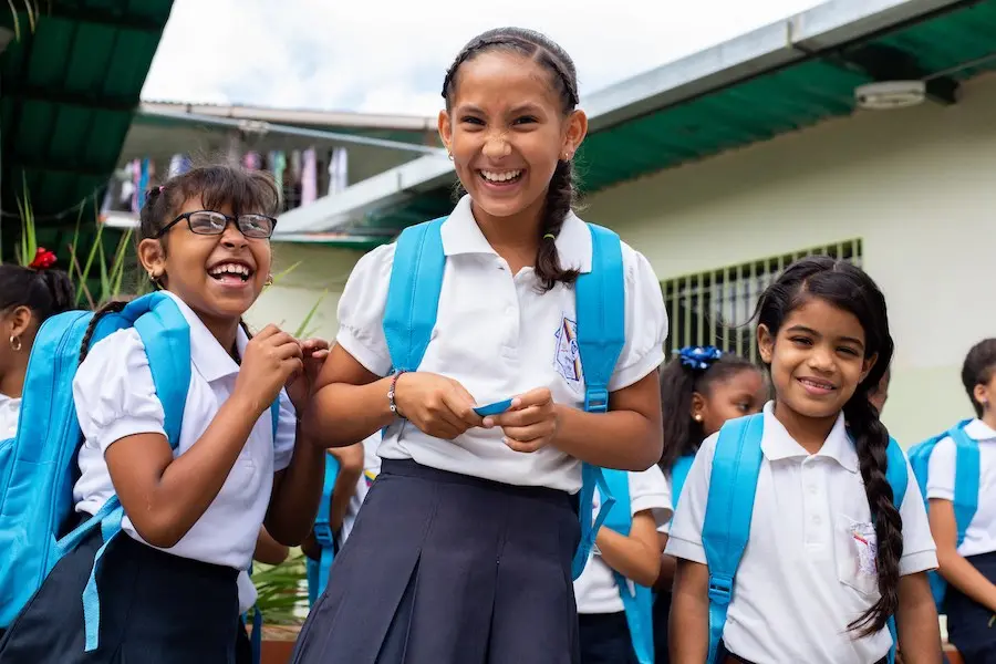 Children Smiling with UNICEF Backpacks