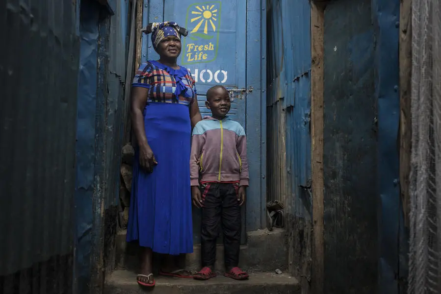 Woman and Child in Alleyway